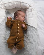 Anker's onesie for baby by PetiteKnit, knitting pattern Knitting patterns PetiteKnit