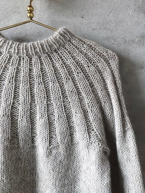 Sunday sweater by PetiteKnit, knitted in light beige Önling No 1 sustainable yarn made of merino wool and angora