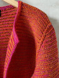 Tweedie jacket by Hanne Falkenberg, No 20 knitting kit (3 colors) | 93 Tomato red, 59 Fuchsia, 11 Dark orange