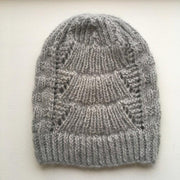 Magnum hat with lace pattern, knitted in Önling no 1 merino wool and lamana cusi alpaca, light grey