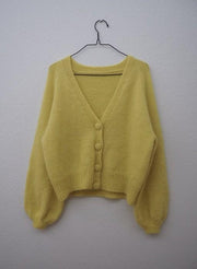 Balloon cardigan designed by Petiteknit, yellow knitted sweater