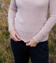 Bolette rose knitted and elegant sweater with smock features, made in Isager Merilin