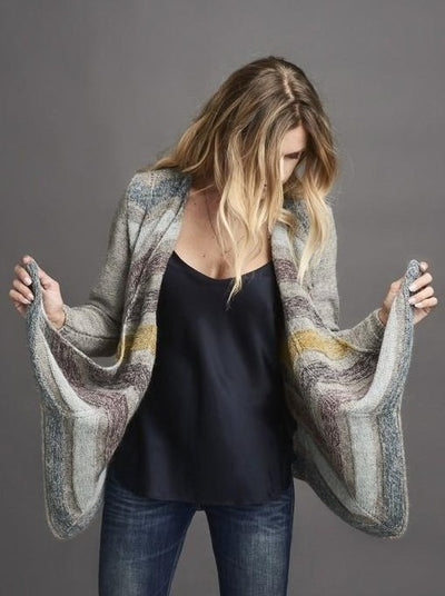 Dione knitted cardigan with drapes at the front, grey with stripes in dusty, blue, yellow and purple colors, made in Isager Alpaca and Spinni wool, the front