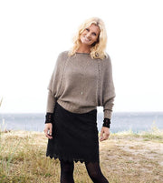 Benedicte sweater with bat (dolman) sleeves, knitted in beige Isager Merilin and Alpaca.