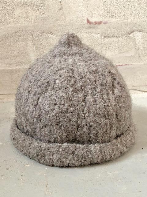 Knitting pattern for a felted hat in organic yarn.