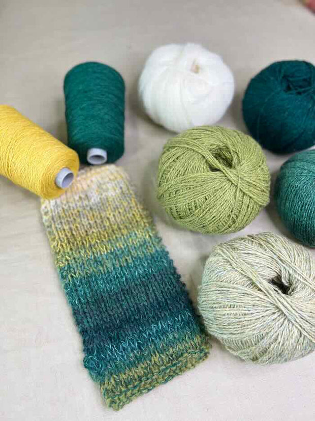 Iridia sweater by Önling, knitting kit ex silk mohair | Forest green (38), Sunflower (22), 01 Winter white, 90 Oats, 29 Spring green, 25 Avocado (x), 53 Emerald