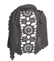 Lenes shawl, a knitted shawl with a flower panel at the back, made in dark grey Isager Highland wool and Silk Mohair