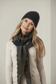 Lenes shawl and hat, a knitted shawl with a flower panel at the back, made in black Isager Highland wool and Silk Mohair