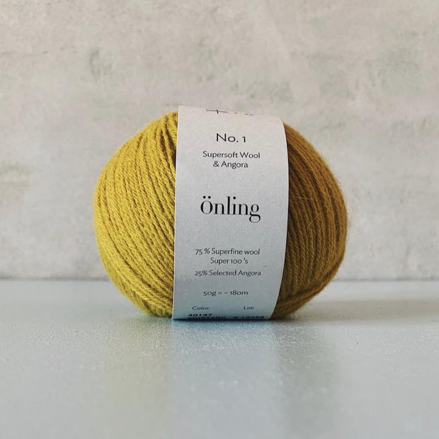 Önling No 1 is sustainable yarn made of merino wool and angora, olive yellow