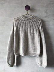 Sunday sweater designed by PetiteKnit, knitted in light beige Önling No 1 sustainable yarn made of merino wool and angora
