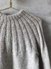 Sunday sweater by PetiteKnit, knitted in light beige Önling No 1 sustainable yarn made of merino wool and angora